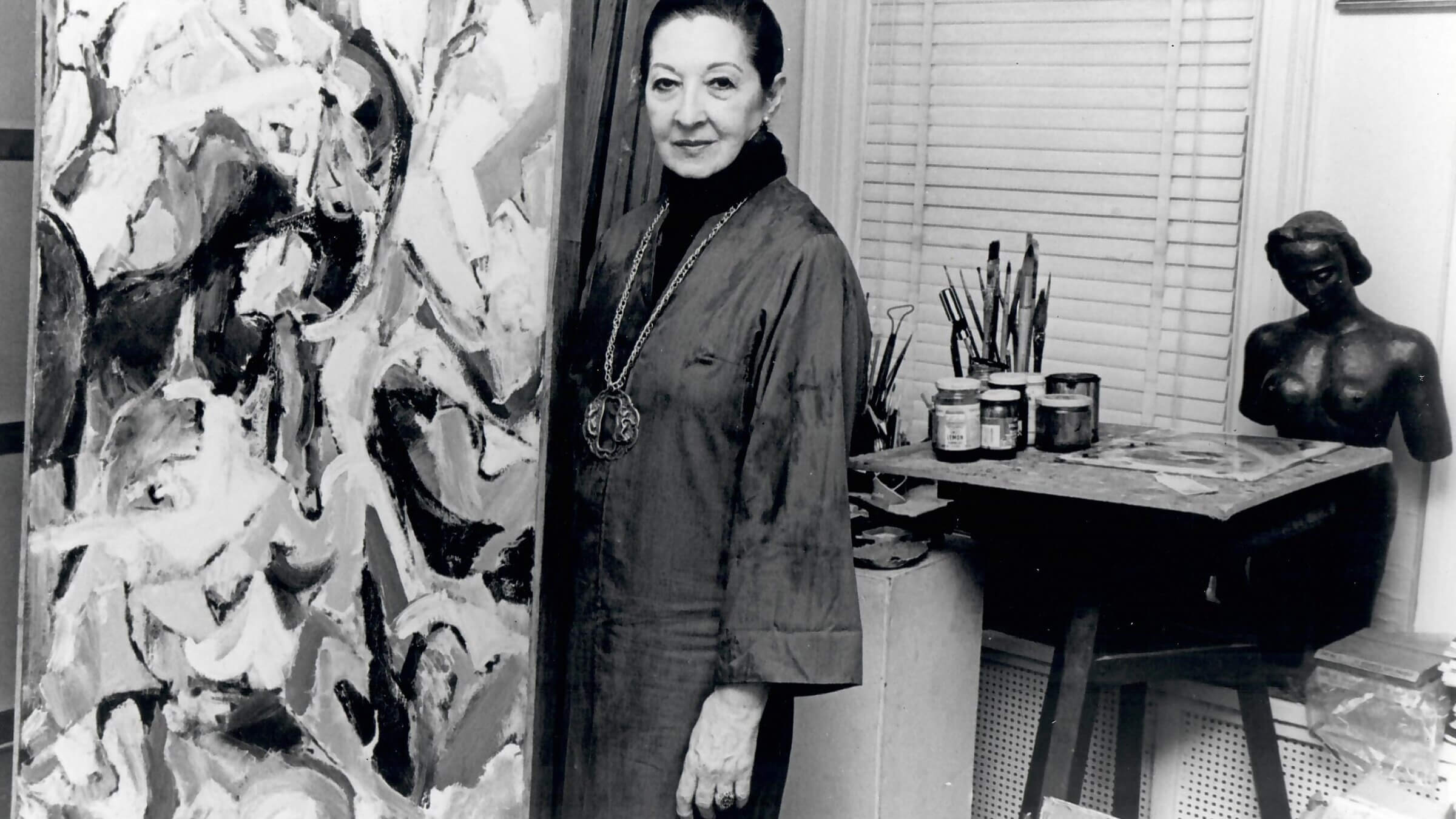 Anna Walinska with her painting <i>The Naked and the Dead</i>, which is now in the the collection of the Eskenazi Museum of Art.