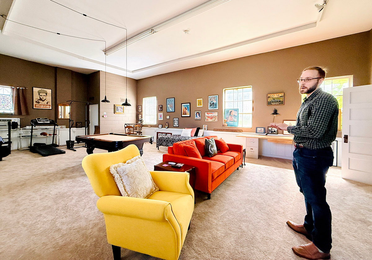 The synagogue-turned-Airbnb includes a game room with a pool table.