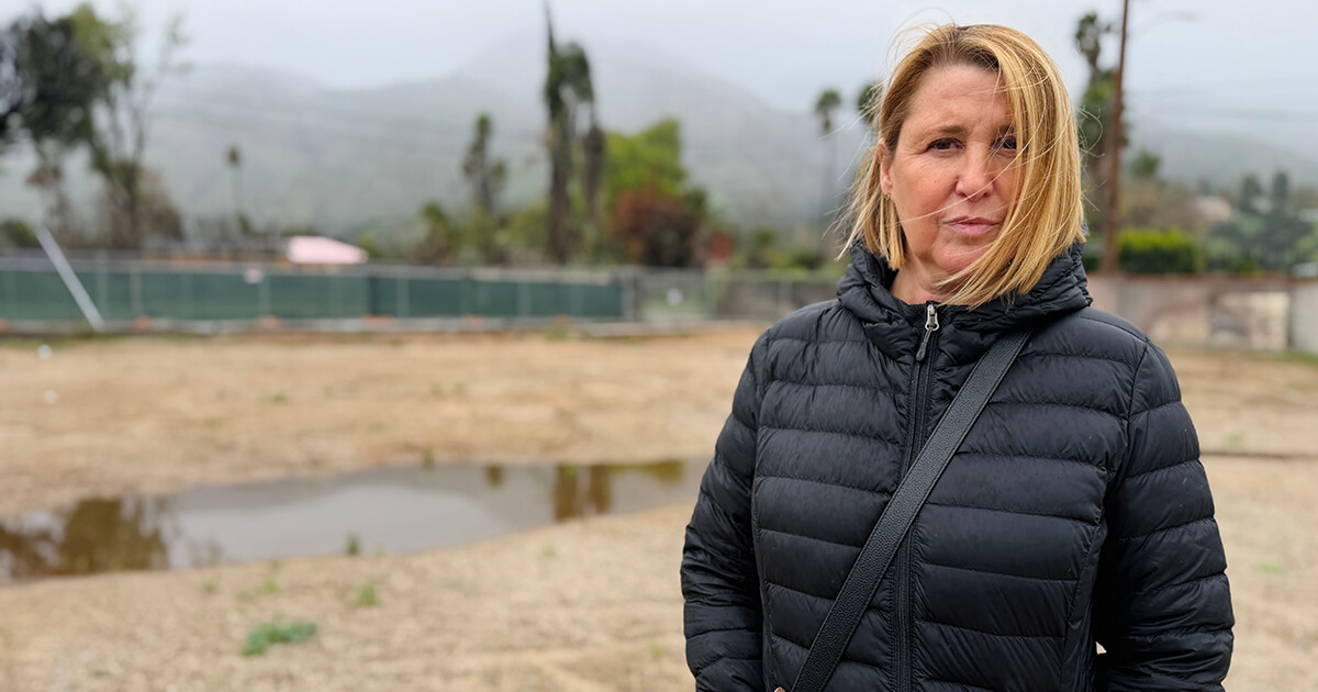 Cantor Ruth Berman Harris at the site of the Pasadena Jewish Temple and Center. The synagogue's buildings were destroyed in a wildfire.
