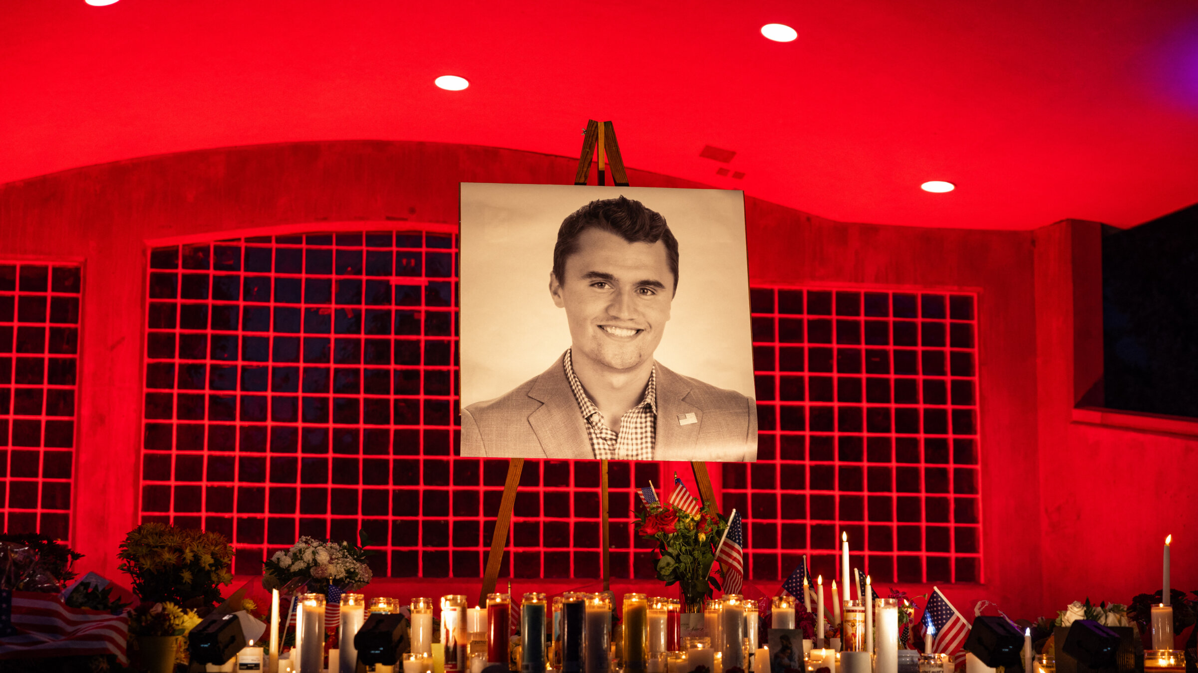 A photo of Charlie Kirk at his makeshift memorial in Orem, Utah, a day after he was shot during a public event at Utah Valley University, Sept. 11. President Donald Trump is invoking Kirk's death to target his political opponents. 