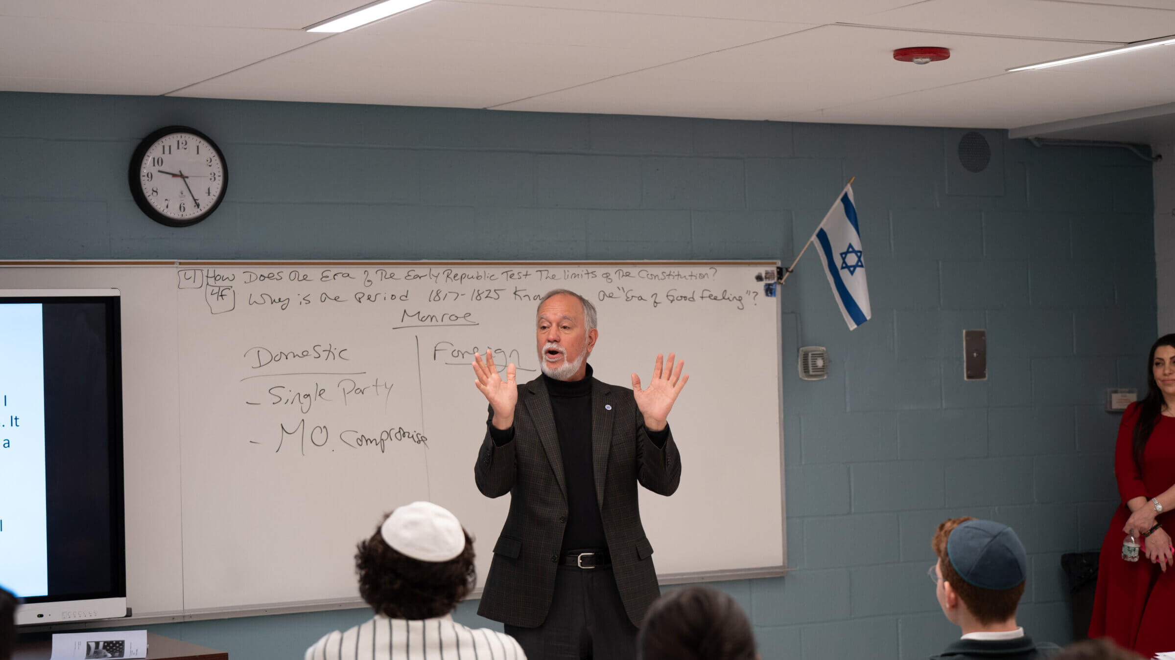 CUNY chancellor Félix Matos Rodríguez speaks to a classroom of students at Yeshivah of Flatbush Joel Braverman High School.