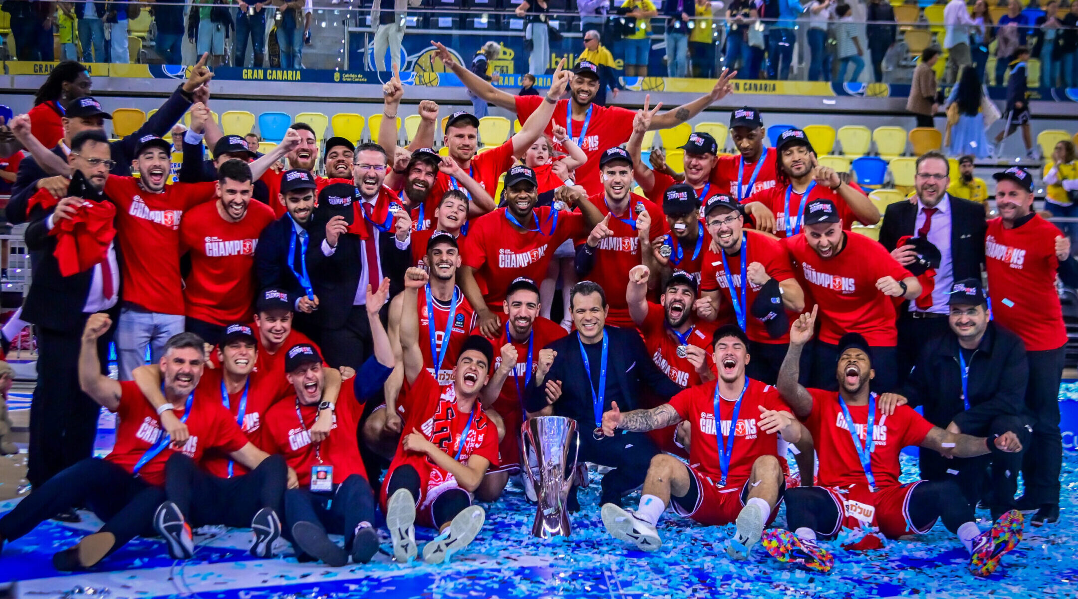 Hapoel Tel Aviv players celebrate with the trophy after defeating Gran Canaria in the EuroCup final in the Gran Canaria Arena, Spain, April 12, 2025. (Flash90)