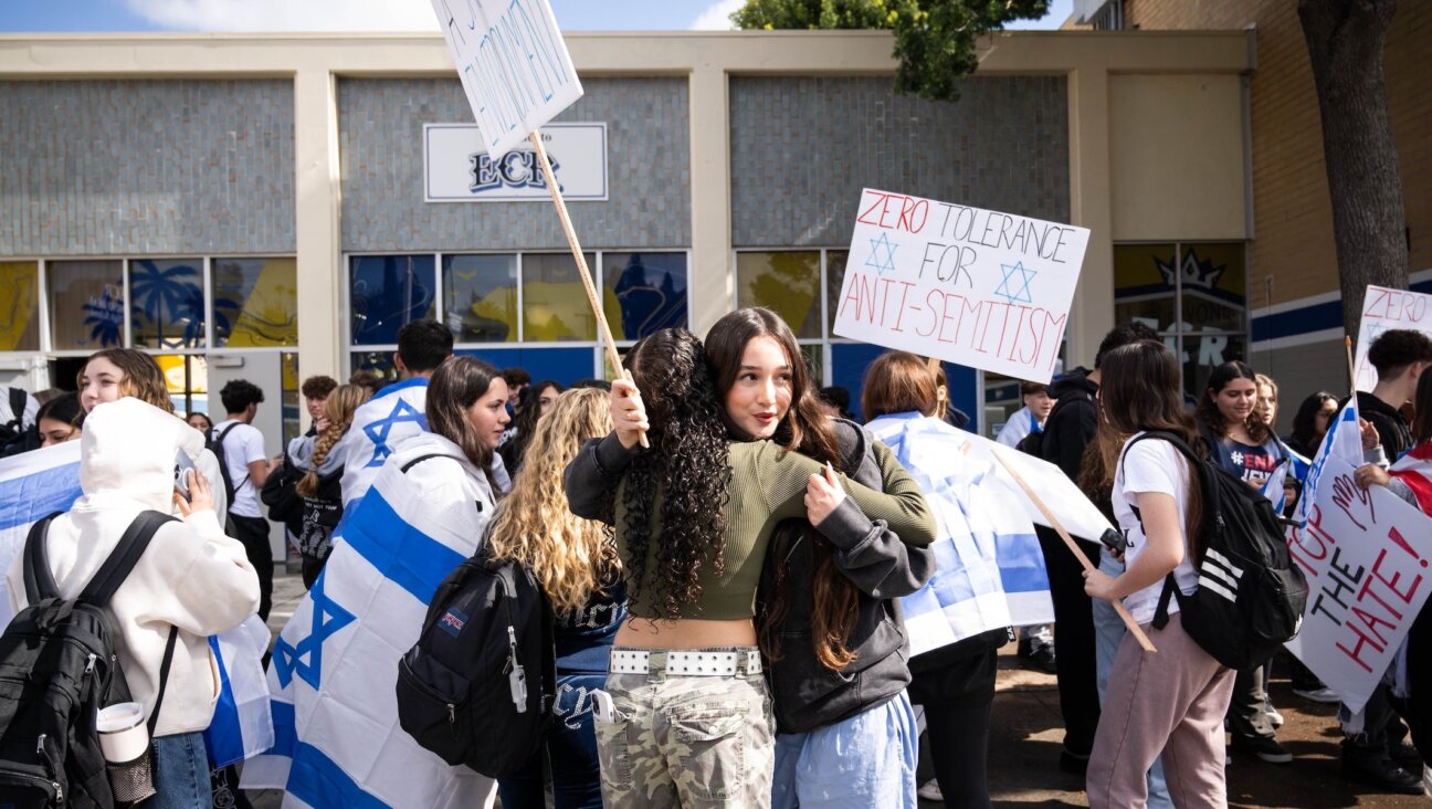 Jewish students at El Camino Real Charter High School walk out to protest antisemitic incidents at the Los Angeles school on Feb. 27, 2024.