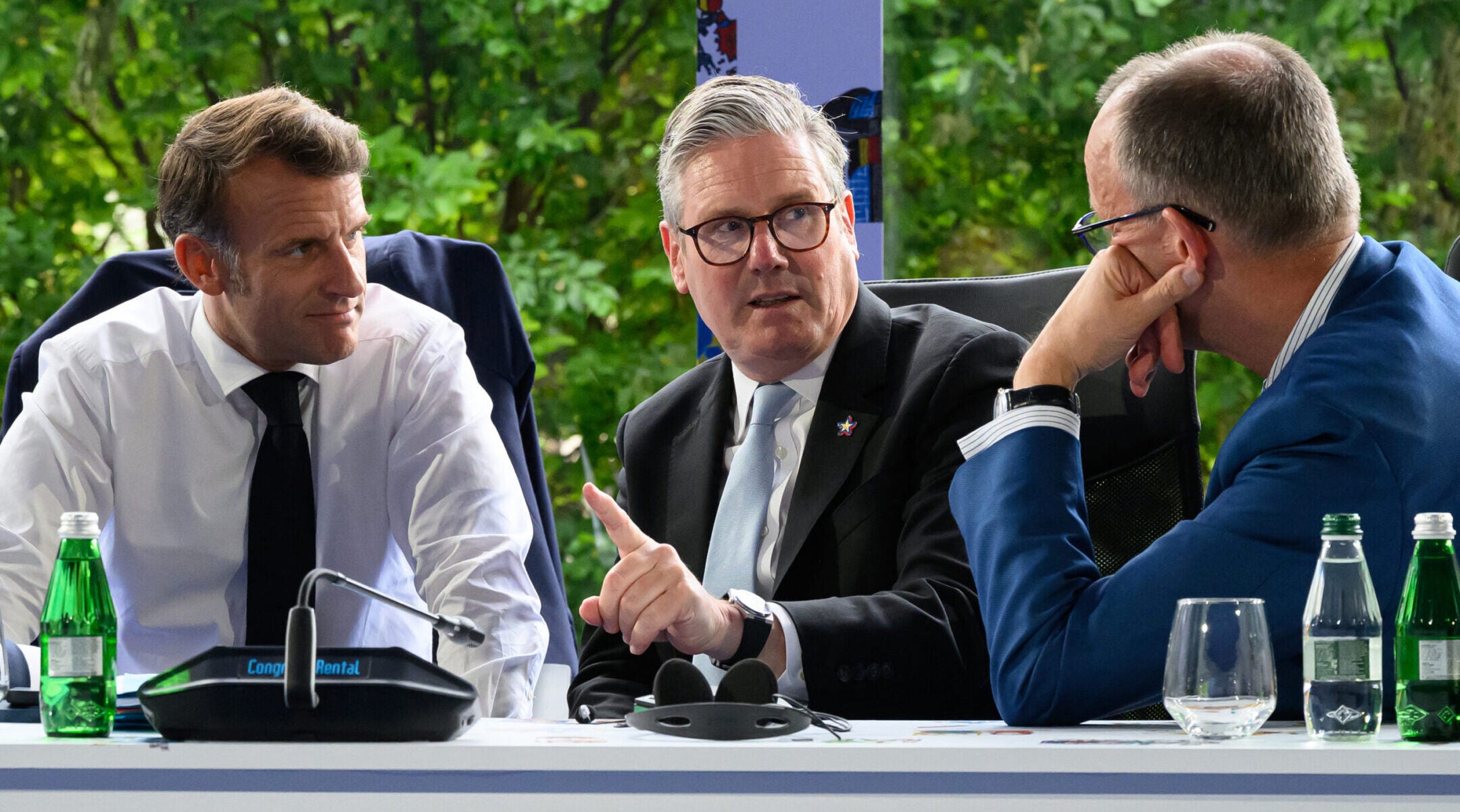 From L to R, France’s President Emmanuel Macron, Britain’s Prime Minister Keir Starmer and Germany’s Chancellor Friedrich Merz take part in a meeting during the European Political Community summit in Tirana, Albania, on May 16, 2025. (Leon Neal / Pool/AFP via Getty Images)