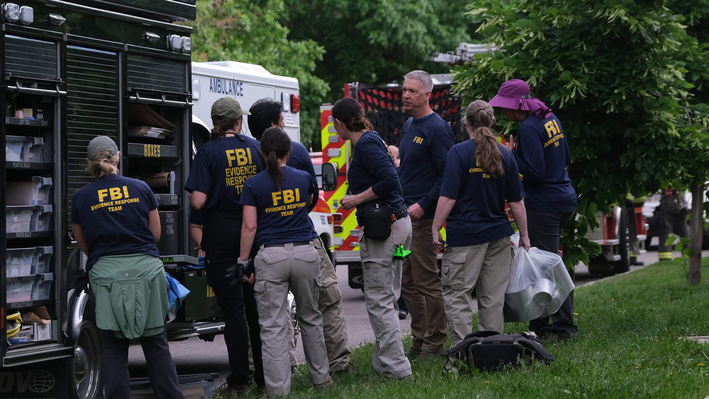 An FBI team at the scene in Boulder, Colorado, after a June 1 attack left several people with burns and other injuries.