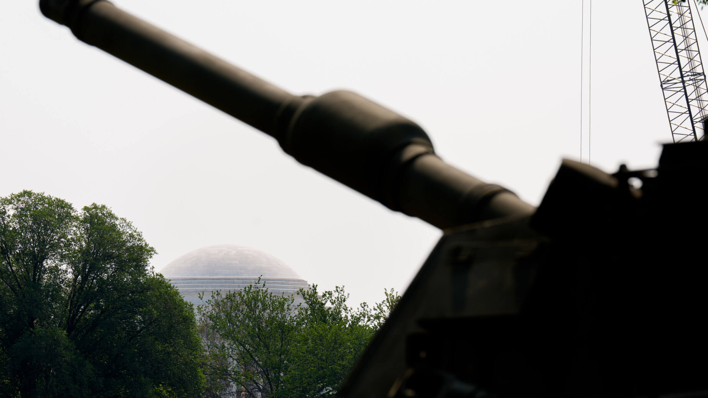 U.S. Army soldiers work on an assortment of  tanks to prepare for a military parade.