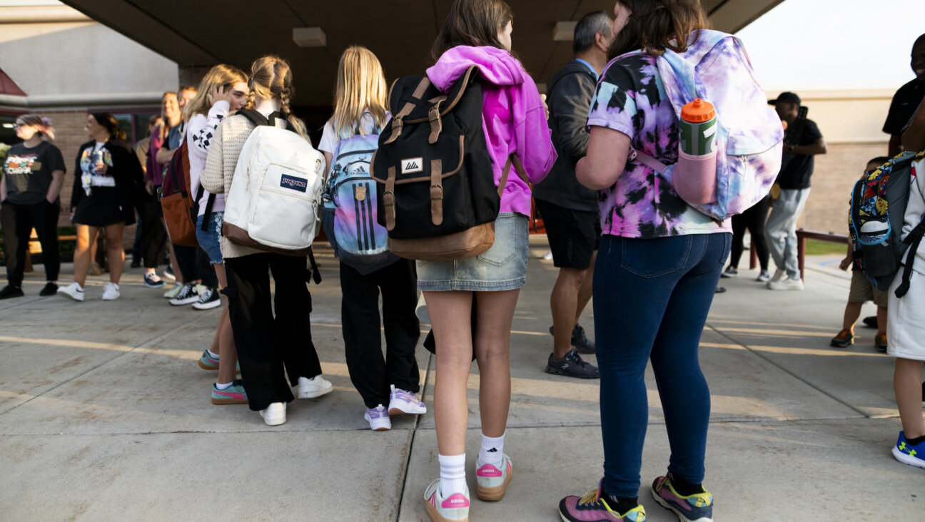 Students arrive for the first day of school at Deerwood Elementary on September 2 in Eagan, Minnesota.
