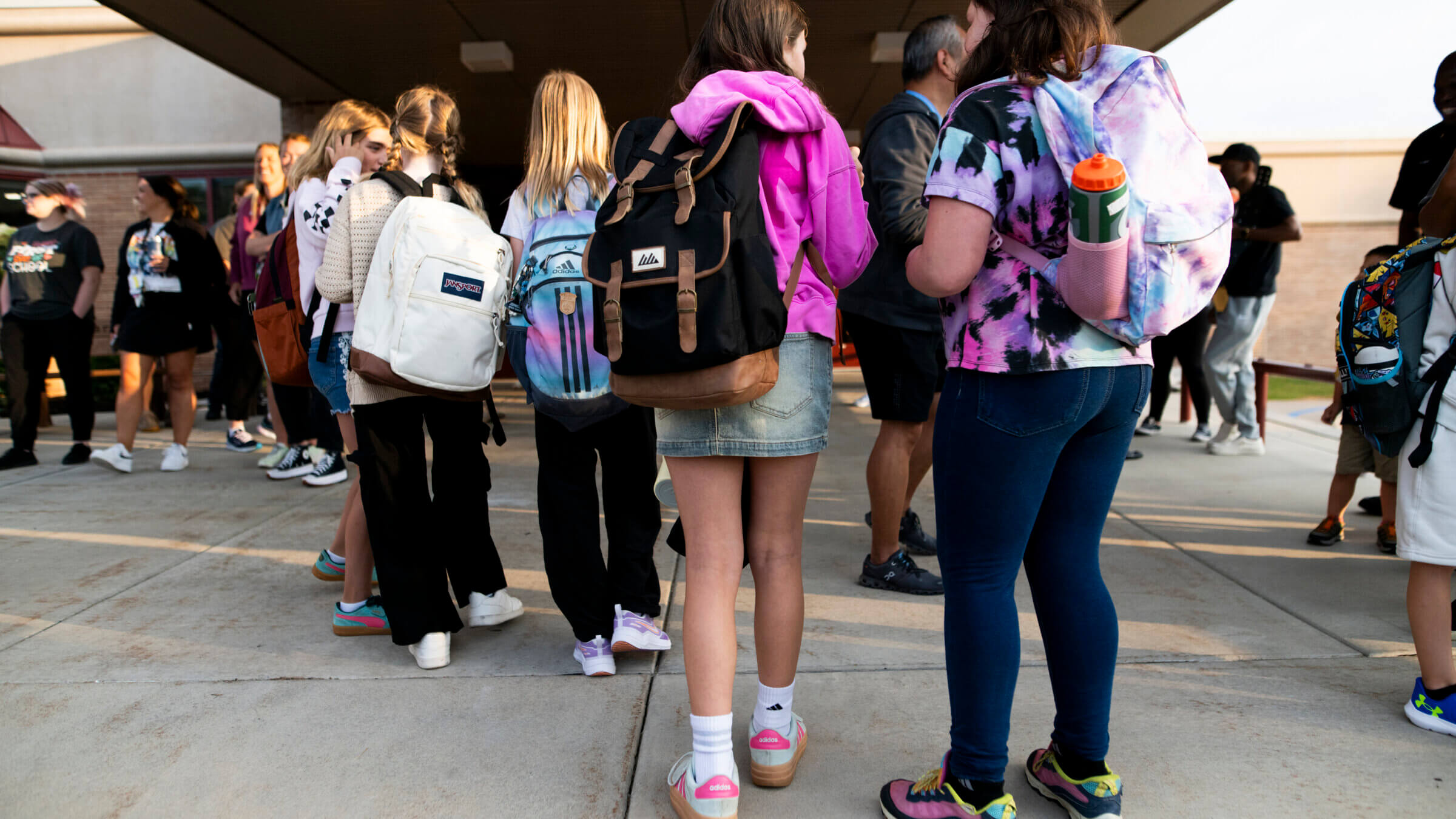 Students arrive for the first day of school at Deerwood Elementary on September 2 in Eagan, Minnesota.