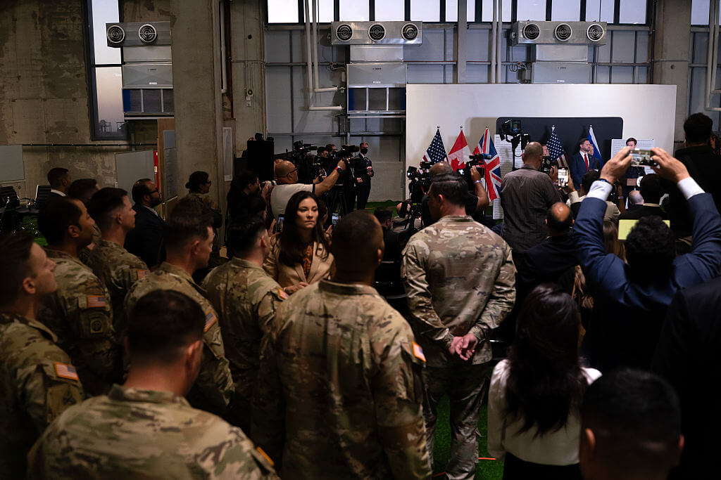  Members of the U.S. military and other attendees listen as Vice President JD Vance speaks at a press conference at the Civilian Military Coordination Center on October 21, 2025 in Kiryat Gat, Israel.