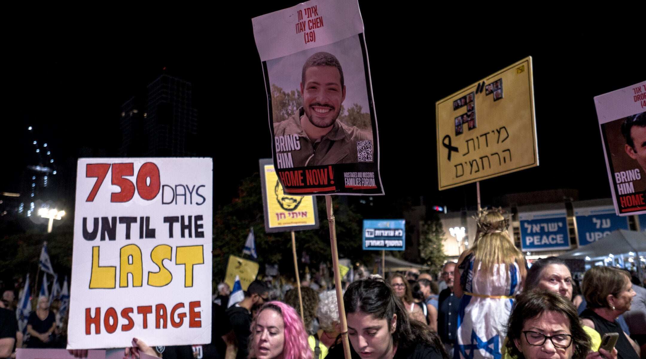 Israelis gather at Hostages Square in Tel Aviv to demand the return of the bodies of 13 citizens still held in Gaza on Oct. 26, 2025.