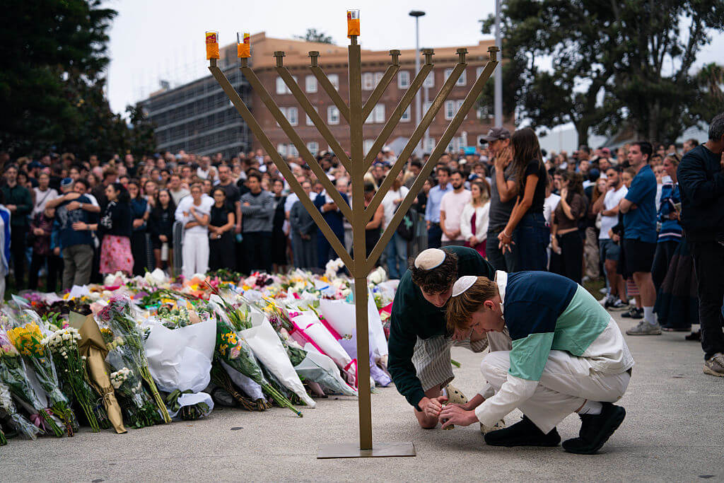 Community members gather outside of Bondi Pavilion at Bondi Beach on Dec. 15 in Sydney.