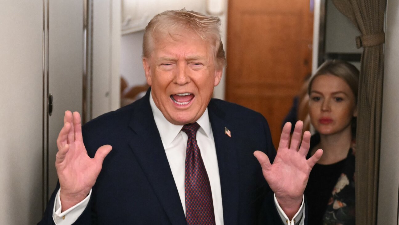 Donald Trump speaks to the press aboard Air Force One Jan. 11.