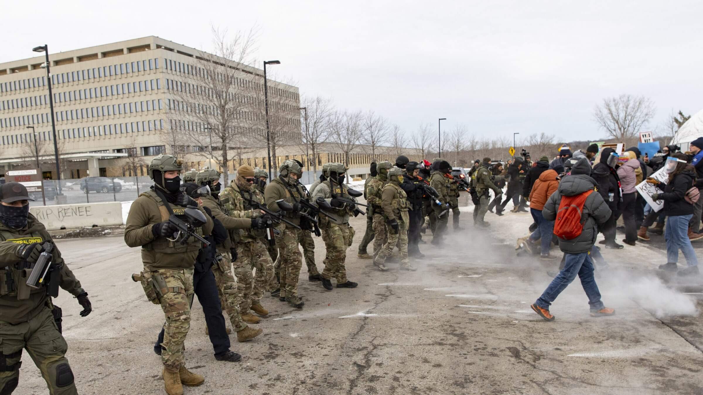 Federal agents shoot pepper balls at protestors outside an ICE facility during a protest against U.S. Immigration and Customs Enforcement (ICE), Jan. 11, 2026. 