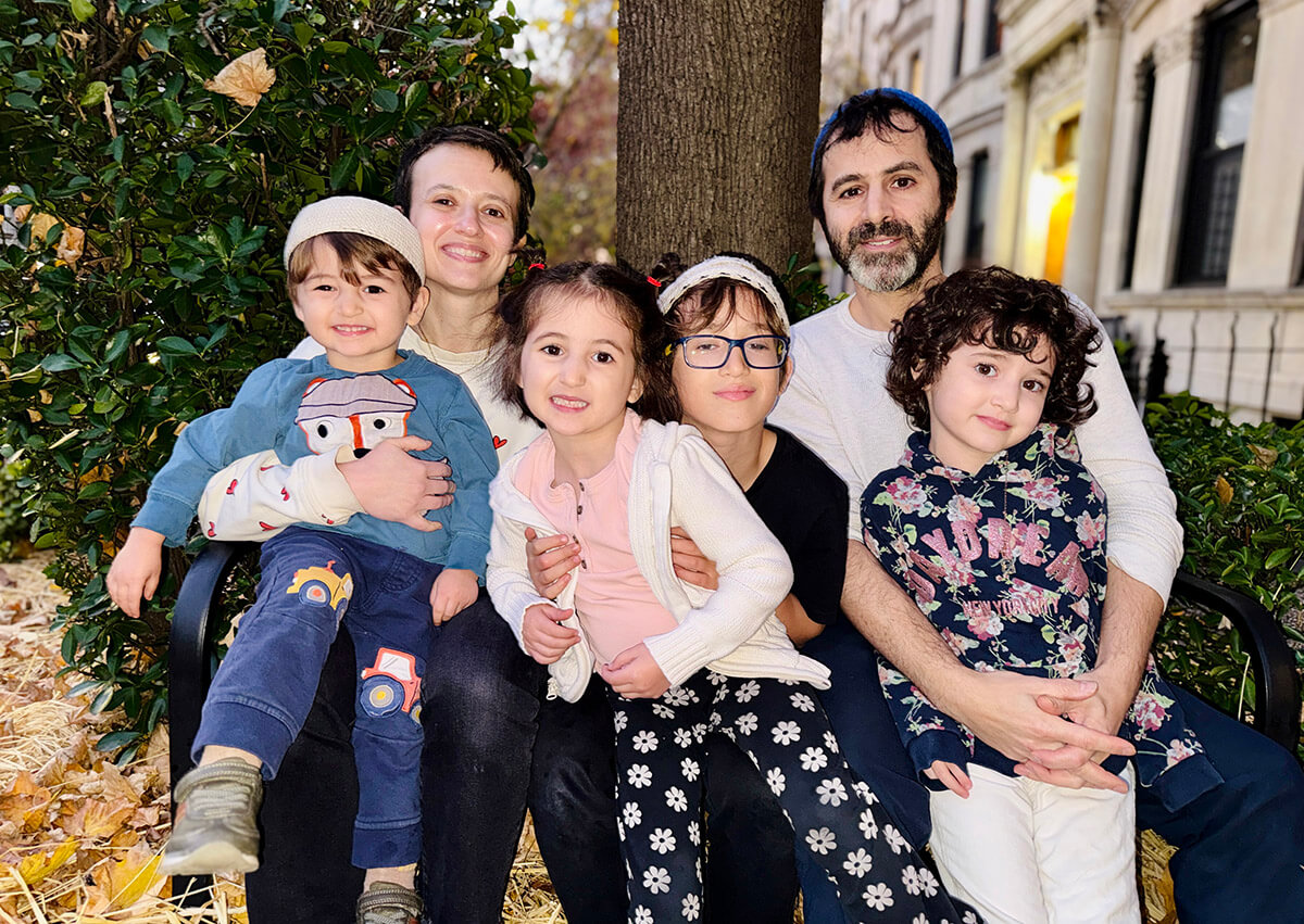 Malya and William Levin with their children left to right: Julius, Mushka, Sammy, and Bari.