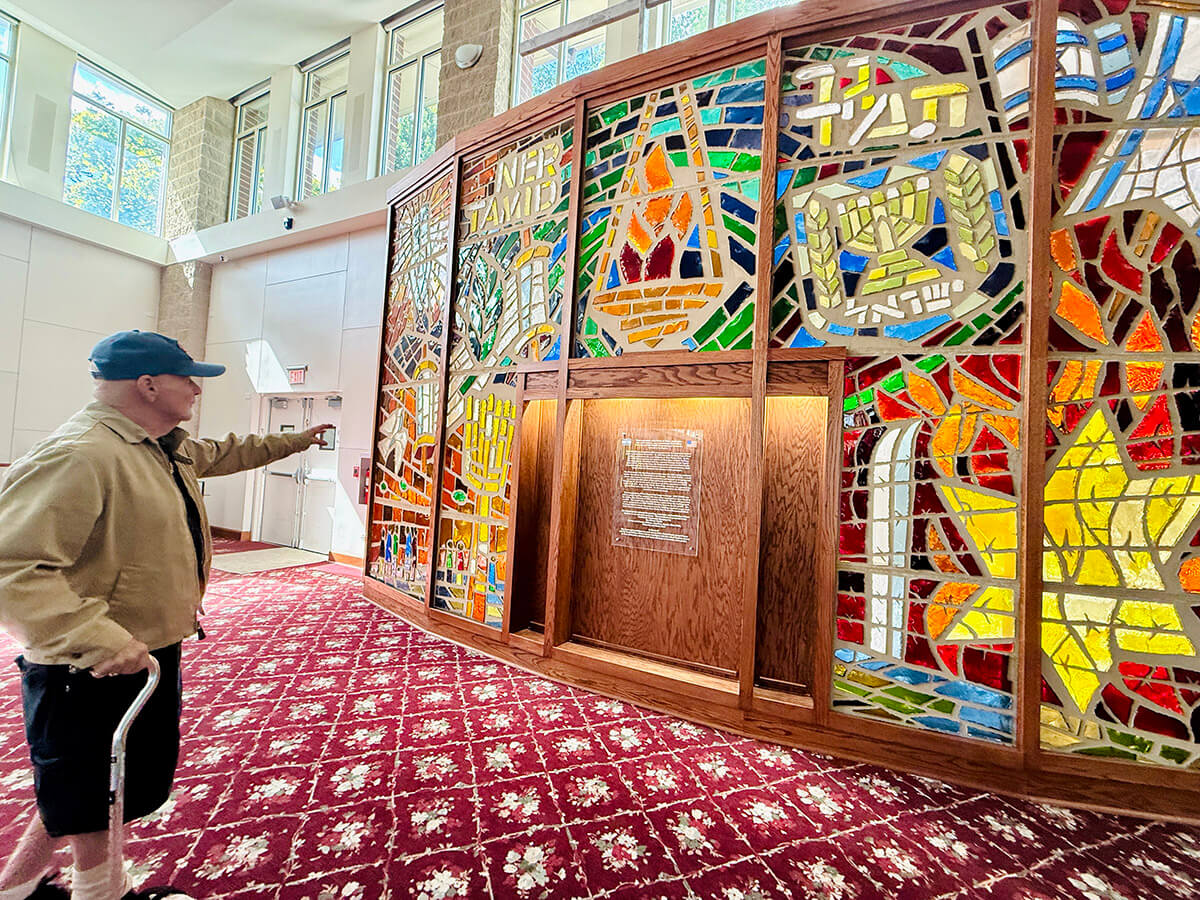 An entire wall of stained glass windows from Congregation Ner Tamid, a Conservative synagogue in West Rogers Park that once hosted 1,000 people for the High Holidays, was relocated 15 miles to the back of the sanctuary at Northbrook Community Synagogue.