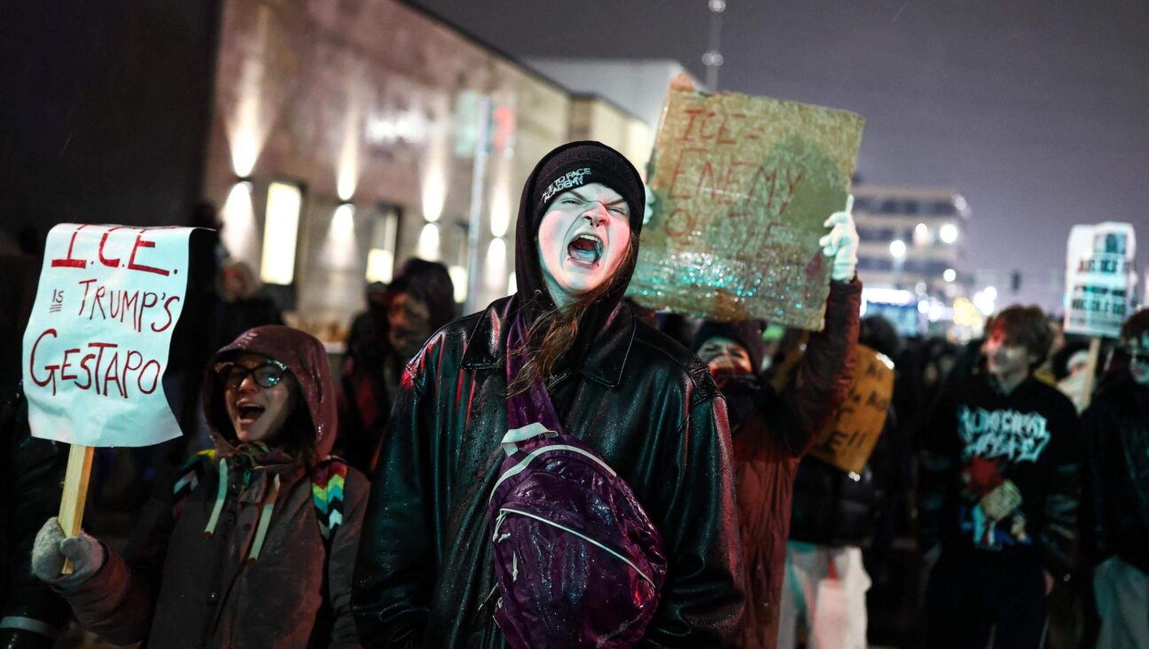 People march during a "Stop ICE Terror" emergency protest in Minneapolis Jan. 8.