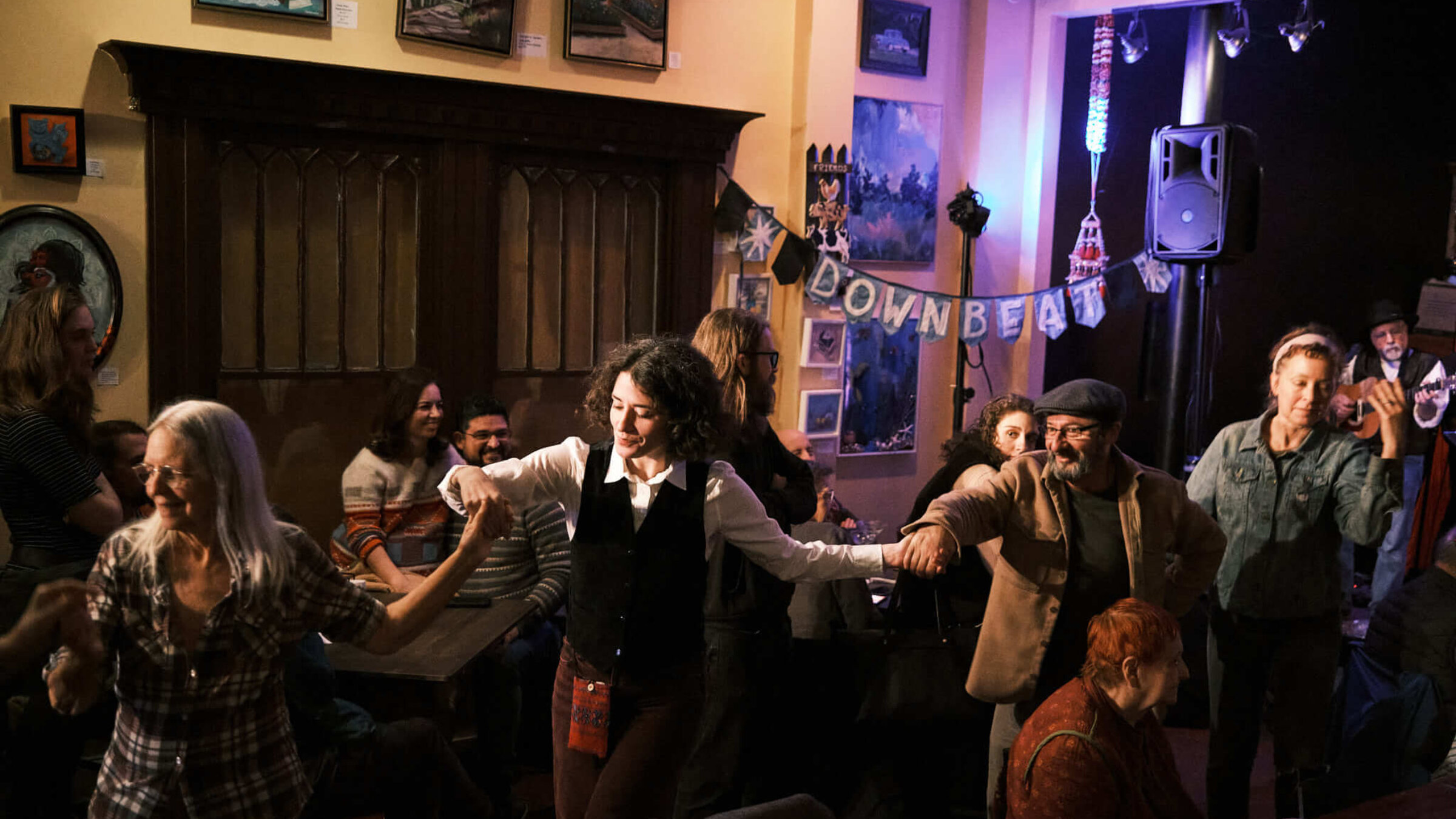 People dancing on the first night of the Richmond Yiddish Week festival, Jan. 10, at the Gold Lion Community Café in Richmond, Virginia. 