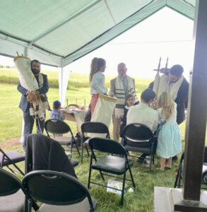 High Holiday services in October 2024 in a tent at the Jakobs family ranch in Sterling, Illinois.