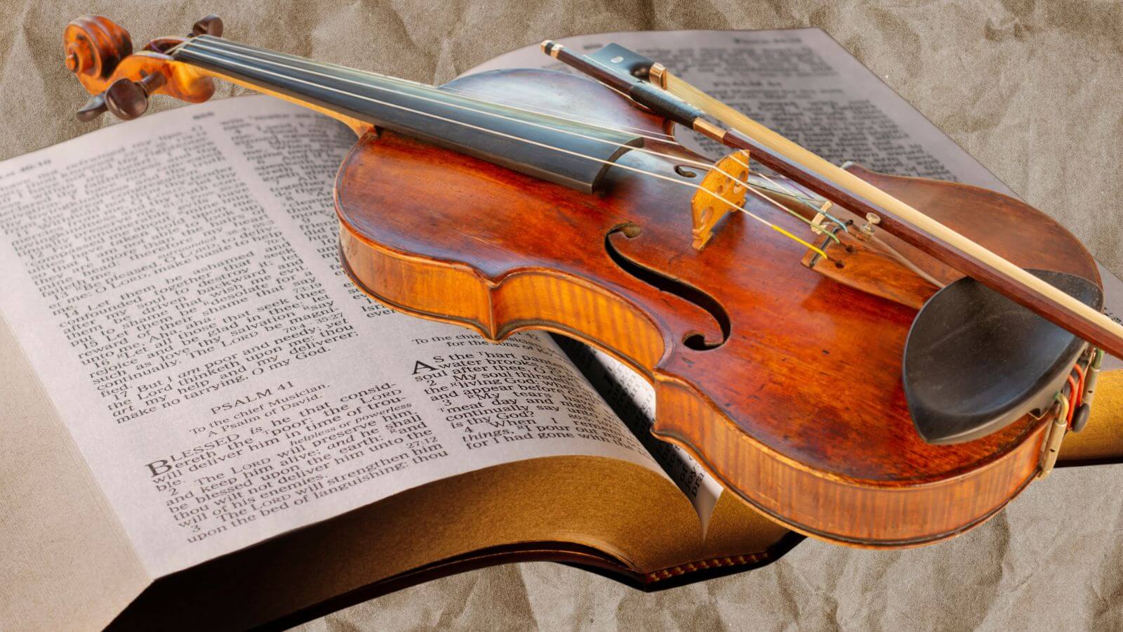 A violin and a bible — an unusual pairing.